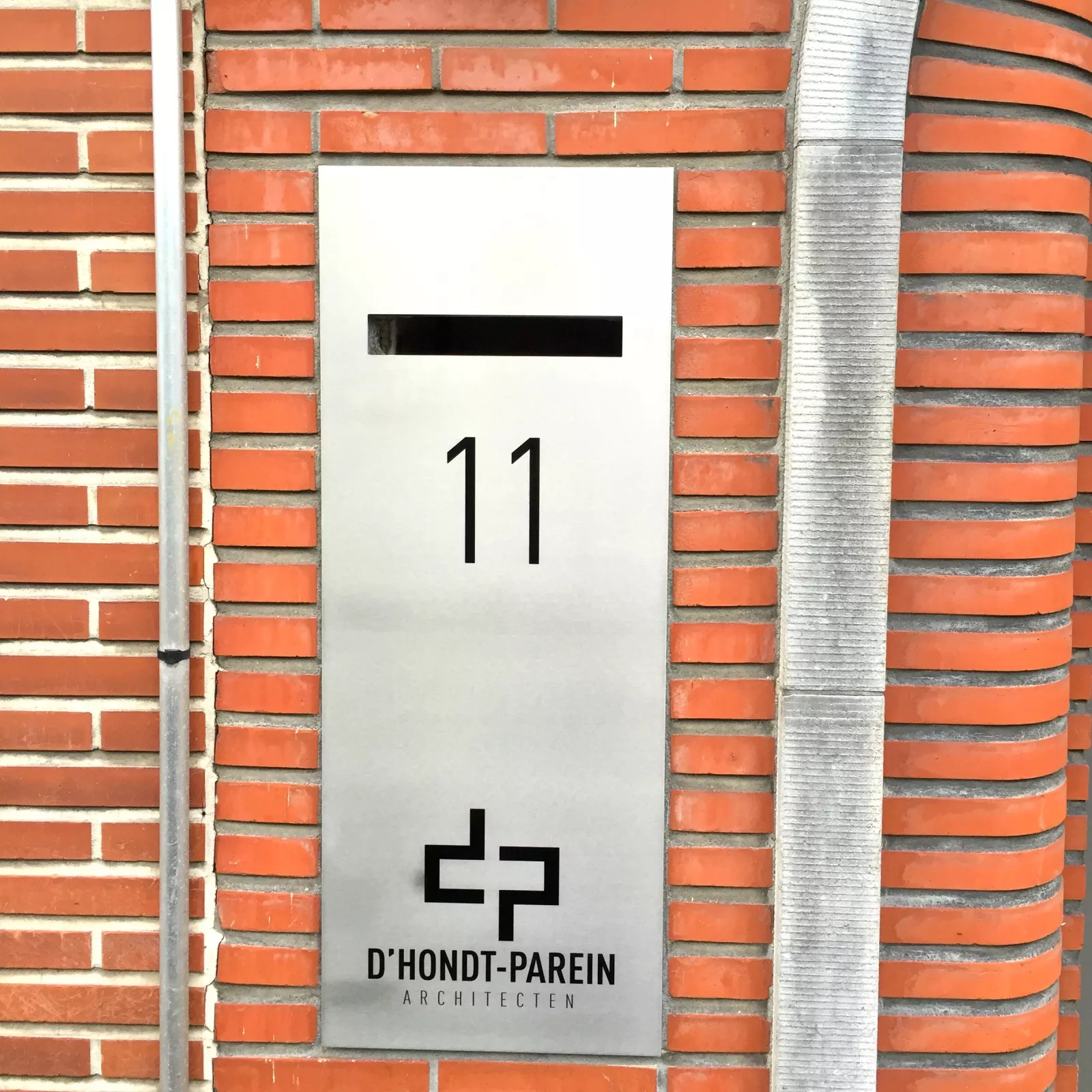Stainless steel nameplate with house number in built-in letterbox
